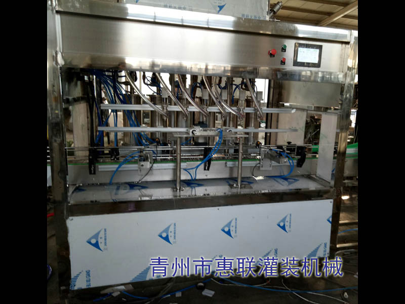 全自動(dòng)直線式油類灌裝機(jī)